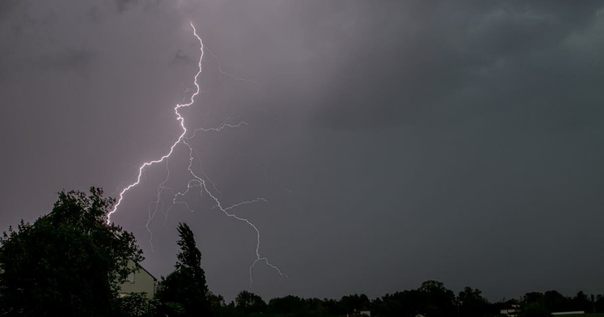 The Eye of the Internet User. A flash of lightning splits the night above the village.