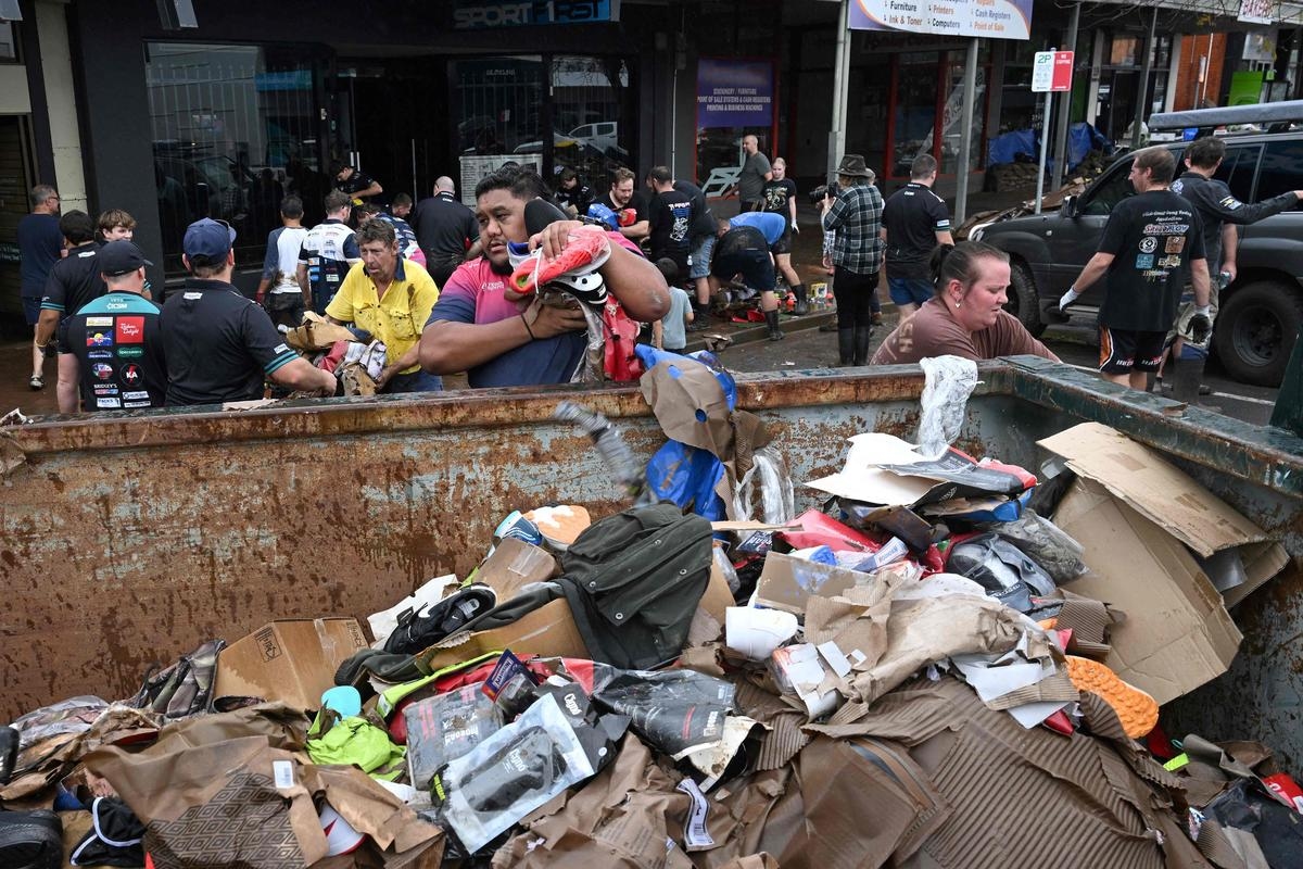 Australian floods: Death toll climbs to four, authorities warn of snakes